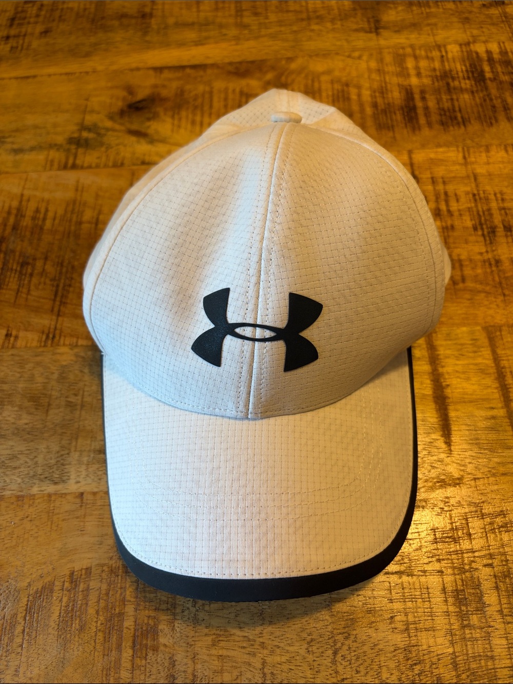 $13 NEVER WORN Under Armour White Hat with Black Logo and Trim